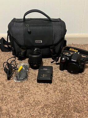 Nikon D5100 Camera Kit with Bag, Lens & Charger